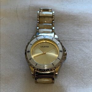 Unlisted by Kenneth Cole Gold-Tone Watch With A Mother-Of-Peal Bracelet Band